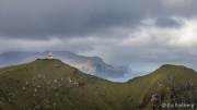 Kallur Lighthouse - Kellingin (69 m) and Risin (71 m) in front of Eysturoy