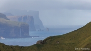 A glimpse of Kellingin (69 m) and Risin (71 m) in front of Eysturoy