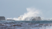 Strong wind and waves erode the northern mole